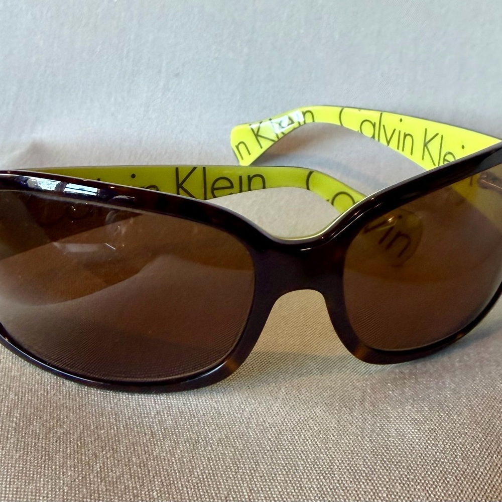 New Calvin Klein Sunglasses with Tortoise Shell Frames and Neon Green Interior